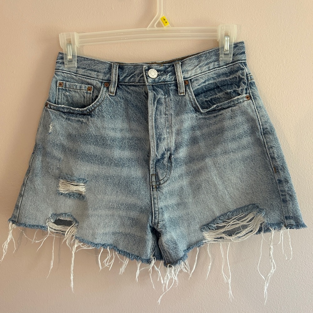 Distressed denim shorts